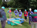 Outdoor team challenge: raft building